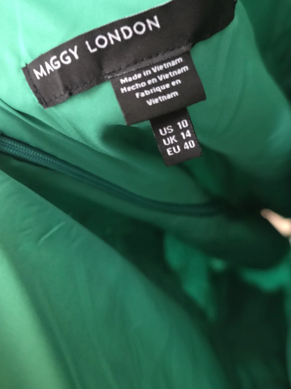 Maggie London Green Eyelet Ruffle Sleeve V-Neck Dress.